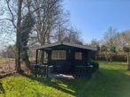 Naturliebhaber aufgepasst! Charmantes Einfamilienhaus in idyllischer Lage von Jheringsfehn - Blockhaus